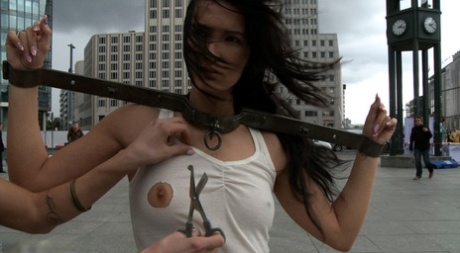 Dark-haired girl is humiliated and fucked while in public