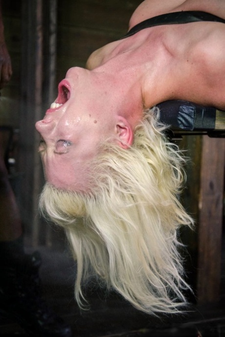 Blonde slave Cherry Torn bound with leather for footjob & forced deepthroat