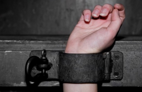 Barely legal Brazilian sub Sara Scott posing bound in the dungeon