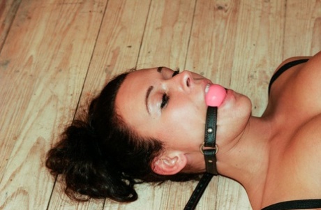 Bound & ball-gagged babe Vixen gets toyed wearing fishnets & red heels